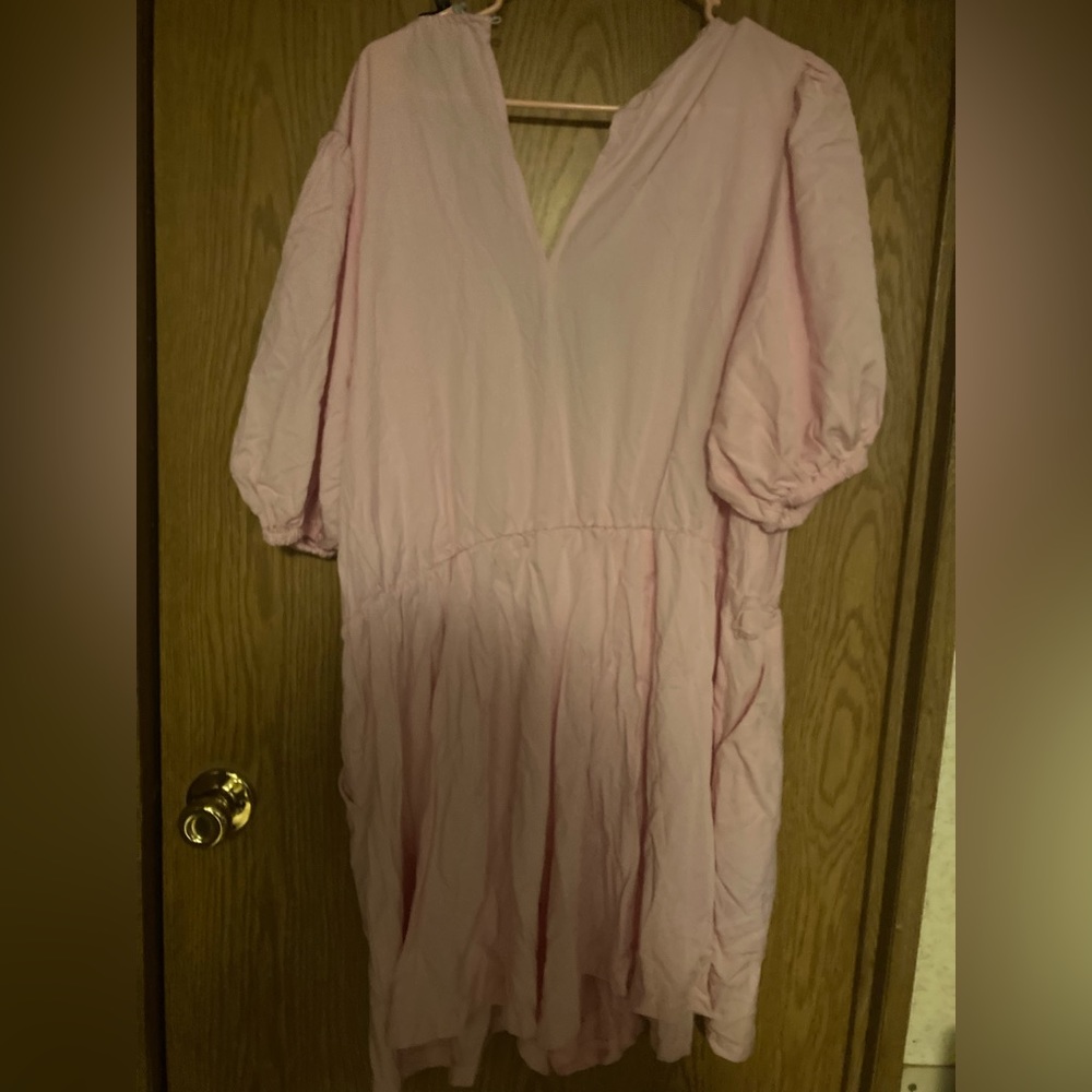 A pink jumpsuit from Eloquii.Size 18